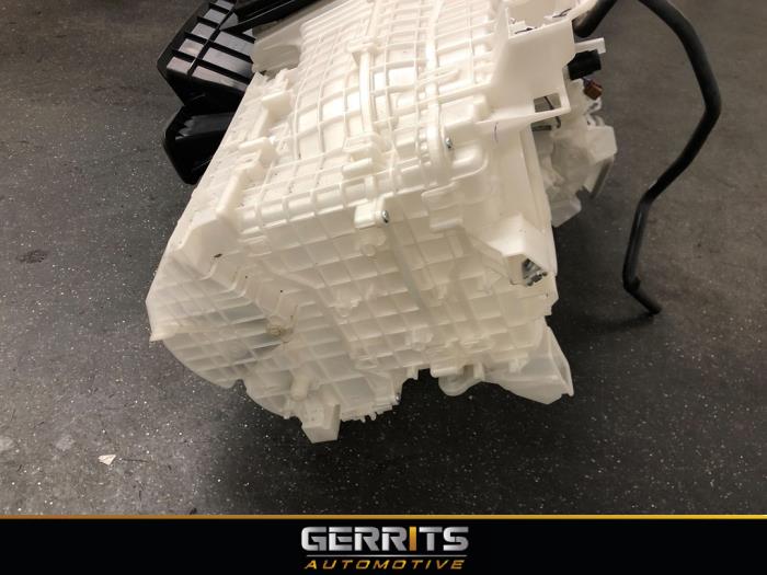 Kachelhuis van een Toyota Corolla Cross 2.0 VVT-i 16V Hybrid 200 2022