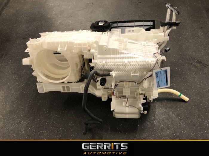 Kachelhuis van een Toyota Corolla Cross 2.0 VVT-i 16V Hybrid 200 2022