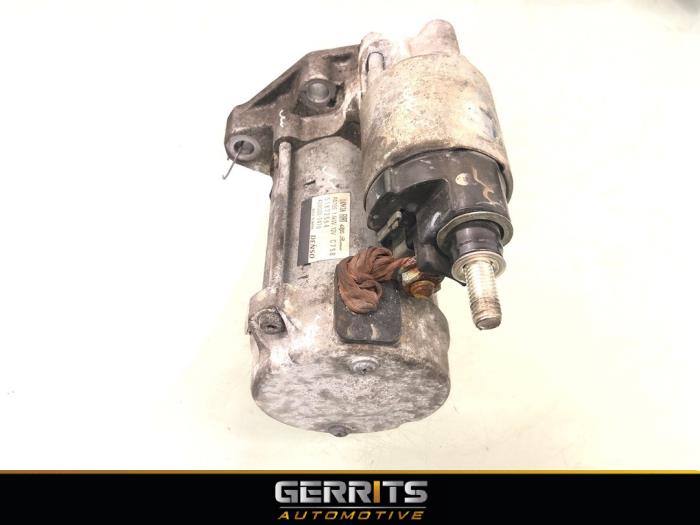 Startmotor van een Fiat Punto III (199) 0.9 TwinAir Turbo 100 2014