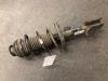 Opel Corsa E 1.4 16V Mac Phersonpoot links-voor