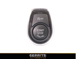 Gebruikte Start/Stop schakelaar BMW 3 serie Touring (F31) 318i 1.5 TwinPower Turbo 12V Prijs € 24,99 Margeregeling aangeboden door Gerrits Automotive BV