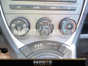 Gebruikte Kachel Bedieningspaneel Subaru Trezia 1.33 16V Dual VVT-I Prijs € 48,40 Margeregeling aangeboden door Gerrits Automotive