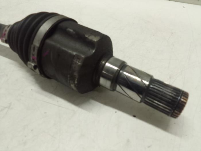 Aandrijfas rechts-achter van een Tesla Model 3 Long Range AWD 75 kWh 2019