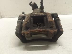 Gebruikte Remklauw (Tang) links-achter Ford Transit 2.0 TDCi 16V Eco Blue 105 Prijs € 90,75 Inclusief btw aangeboden door Autodemontage van de Laar