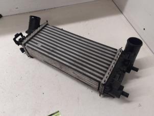 Intercooler van een Ford Focus 3 Wagon 1.0 Ti-VCT EcoBoost 12V 100 2018