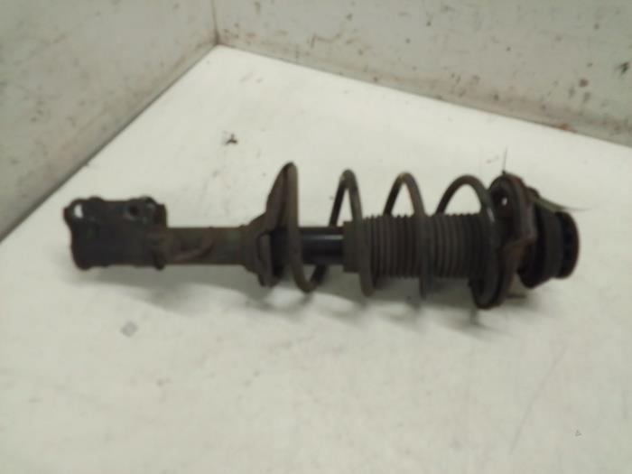 Schokdemperpoot links-voor van een Hyundai i10 (F5) 1.1i 12V 2012