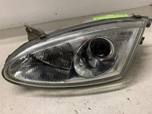 Gebruikte Koplamp links Hyundai Coupe Prijs op aanvraag aangeboden door Autodemontage van de Laar