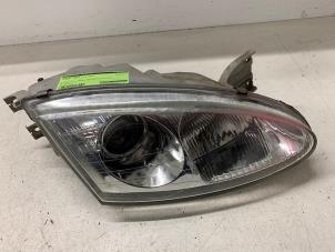 Gebruikte Koplamp rechts Hyundai Coupe Prijs op aanvraag aangeboden door Autodemontage van de Laar