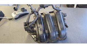 Gebruikte Inlaatspruitstuk Volkswagen Polo V (6R) 1.2 12V BlueMotion Technology Prijs € 50,00 Margeregeling aangeboden door Autodemontage van de Laar