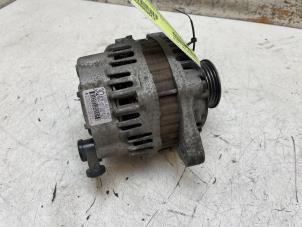 Dynamo van een Opel Agila (B) 1.0 12V 2012