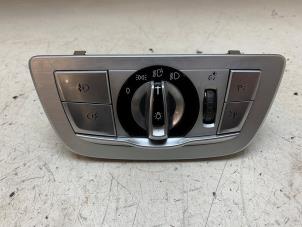 Gebruikte Schakelaar Licht BMW 7 serie (G11/12) 740d,Ld xDrive 24V Prijs € 75,00 Margeregeling aangeboden door Autodemontage van de Laar