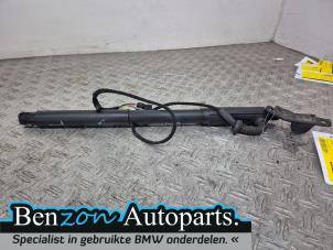 Gebruikte Kofferdekseldemper links-achter BMW X5 Prijs € 120,00 Margeregeling aangeboden door Benzon Autodemontage