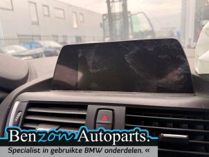 Gebruikte Navigatie Set BMW 1 serie (F20) 118i 1.5 TwinPower 12V Prijs € 250,00 Margeregeling aangeboden door Benzon Autodemontage