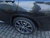 BMW X3 Wielrand achter