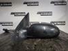 Buitenspiegel links van een Ford Focus 1, 1998 / 2004 1.4 16V, Hatchback, Benzine, 1.388cc, 55kW (75pk), FWD, FXDA, 1998-10 / 2004-10 2000