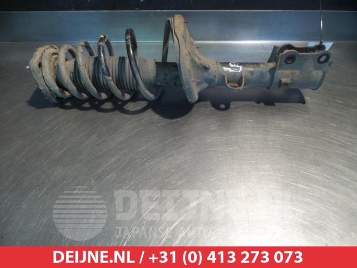 Kia Sportage Schokdemperpoot links-achter O377735