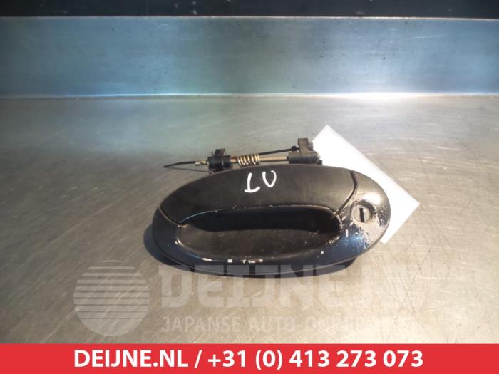 Hyundai Lantra Door handle 4-door, front left O277246