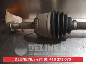 Nissan Primera Aandrijfas rechts-voor O319254 foto 2