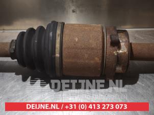 Nissan Primera Aandrijfas rechts-voor O319254 foto 3