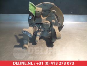 Ssang Yong Korando Achsschenkel rechts hinten O383001 foto 2