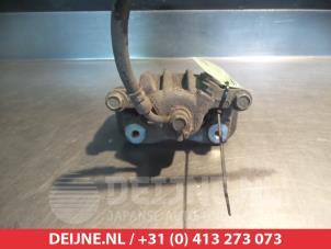 Ssang Yong Korando Bremszange links hinten O376355 foto 2
