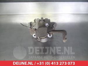 Suzuki SX-4 Bremszange links hinten O376537 foto 2