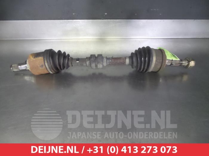 Nissan Primera Aandrijfas links-voor O317789