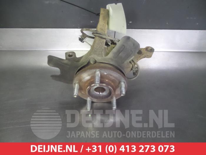Kia Carens Fusee rechts-voor O323648