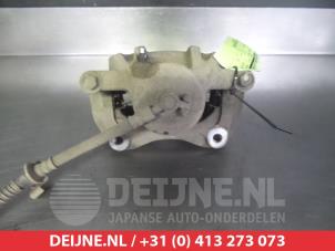 Kia Carens Bremszange links vorne O325011 foto 2