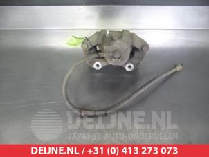 Nissan Cube Front brake calliper, left O324870 photo 2
