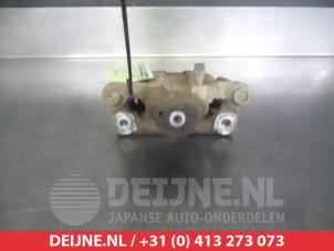 Nissan Cube Remklauw (Tang) links-achter O376169 foto 2
