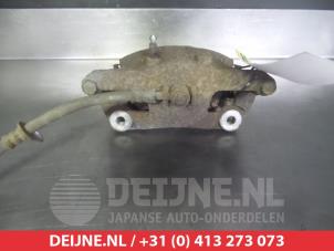 Suzuki SX-4 Bremszange links vorne O325521 foto 2