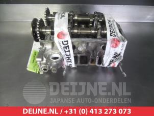 Subaru Legacy Cylinder head O352227 photo 2