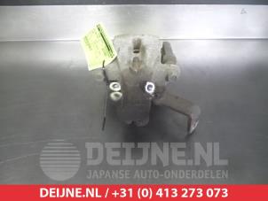 Suzuki SX-4 Bremszange links hinten O376539 foto 2