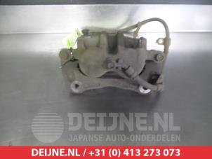 Kia Opirus Bremszange rechts vorne O326312 foto 2