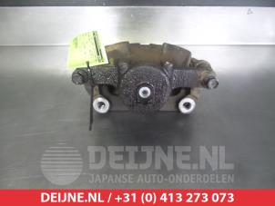 Nissan X-Trail Front brake calliper, right O326168 photo 2