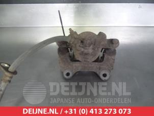 Daihatsu Sirion Bremszange links vorne O325404 foto 2