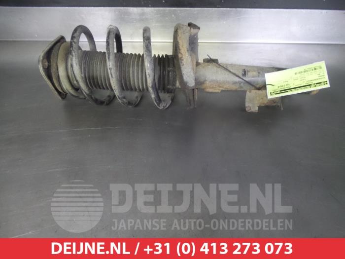 Mazda 3 Schokdemperpoot links-voor O320329
