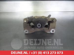 Subaru Legacy Rear brake calliper, left O376236 photo 2