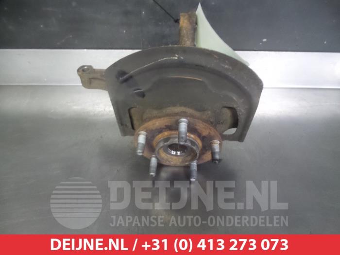 Nissan X-Trail Fusee links-voor O322544