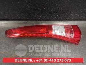 Daihatsu Cuore Rücklicht links O298412 foto 2