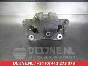 Toyota Auris Bremszange links vorne O325707 foto 2