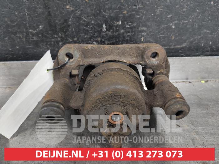 Suzuki Jimny Remklauw (Tang) links-voor O325504