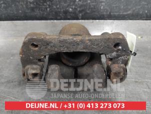 Suzuki Jimny Bremszange links vorne O325504 foto 2