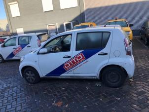 Daihatsu Sirion Tür 4-türig links vorne O272719 foto 2
