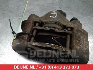Kia Rio Remklauw (Tang) links-voor O325000 foto 2