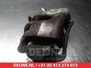 Hyundai IX35 Front brake calliper, left O324711 photo 2