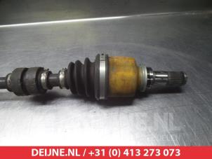 Nissan Micra Aandrijfas links-voor O317745 foto 2