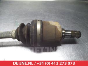 Kia Carens Aandrijfas links-voor O317993 foto 2