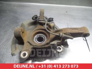 Suzuki Alto Achsschenkel links vorne O26374 foto 2